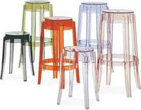 Six Charles Ghost stools by Kartell in different colours.