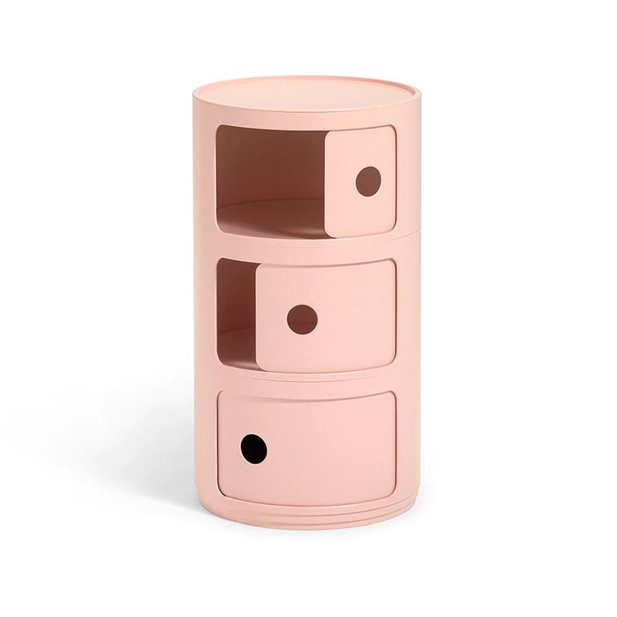 A round pink side 3 drawer with two drawers open in the Componibili range by Kartell.