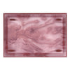 A birds eye view of a pink transparent tray by Kartell.