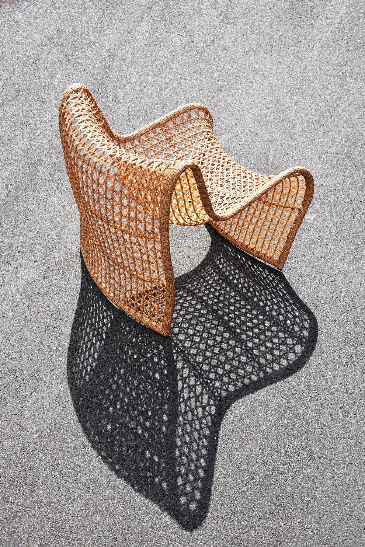 Birds-eye view of a wave chair made of cane.