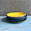 Side view of a ceramic family salad or pasta bowl in a Daffodil colour.