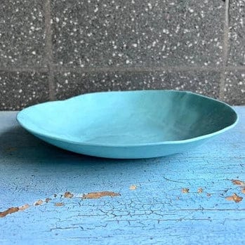 A large ceramic salad or pasta bowl in the colour Teal.