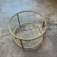 Gold and glass nesting bottom coffee table.