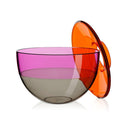 A pink, orange and grey transparent vase by Kartell with it's lid open.