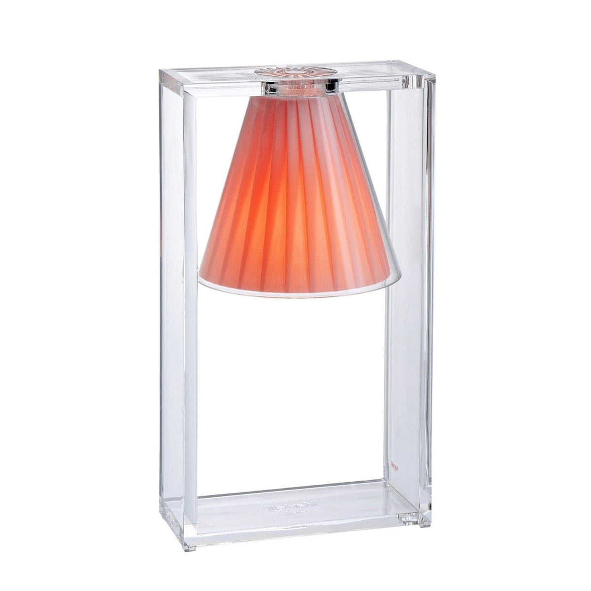 A pink pleated table lamp by Kartell.