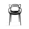 A black plastic chair by Kartell.