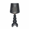 A small black Kabuki lamp by Kartell.