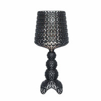 A small black Kabuki lamp by Kartell.