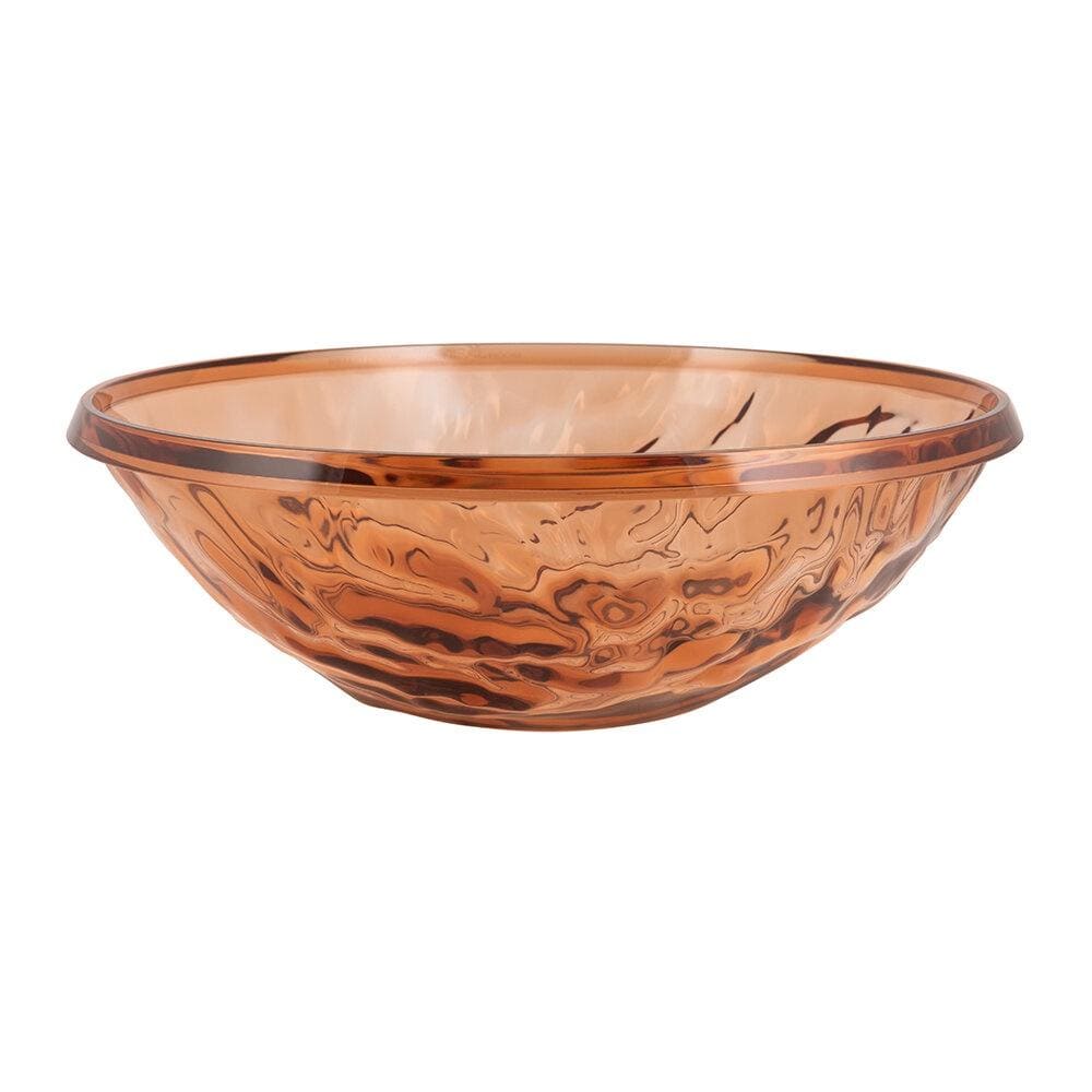 A pink transparent bowl by Kartell.