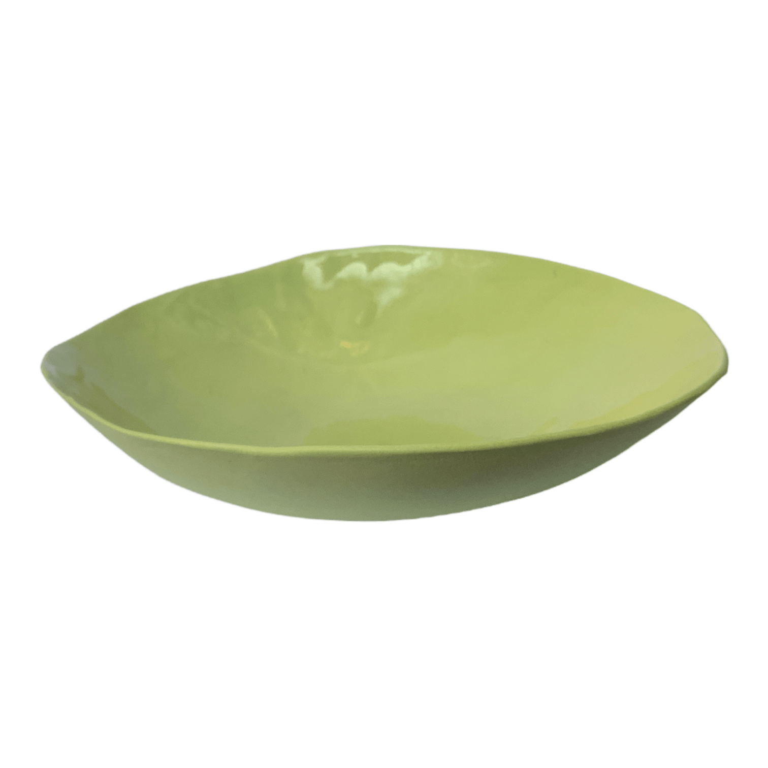 Side on view of a green ceramic bowl.