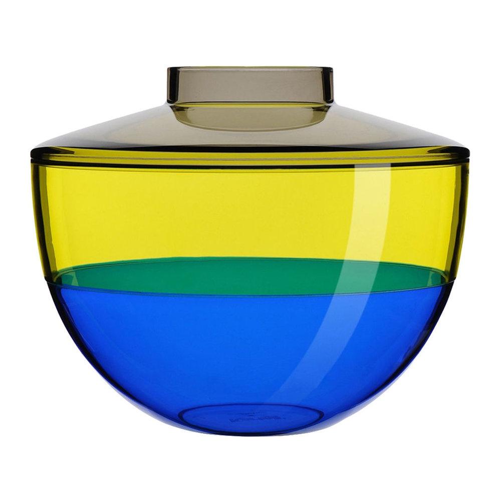 A yellow and blue transparent vase by Kartell.