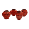 A set of four strawberry vases