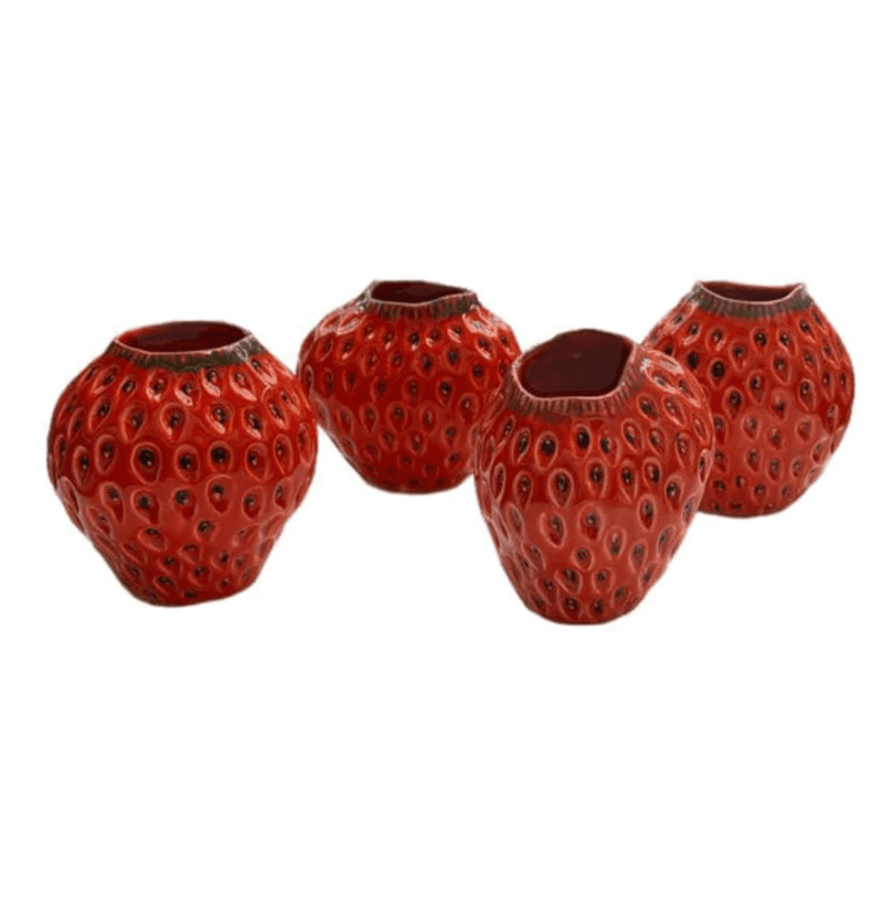 Four 12cm strawberry vases
