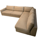 A natural brown coloured modular sofa with four seats.