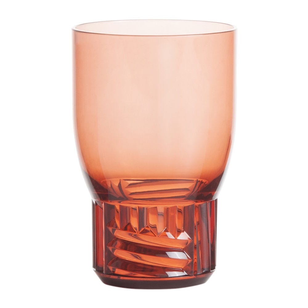 A transparent pink water glass by Kartell.