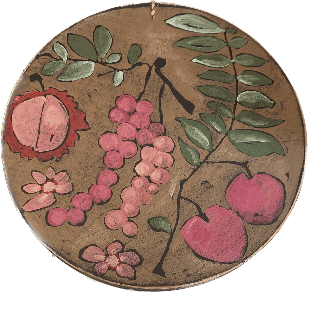 A round wooden piece of wall art with floral and fruit paintings.